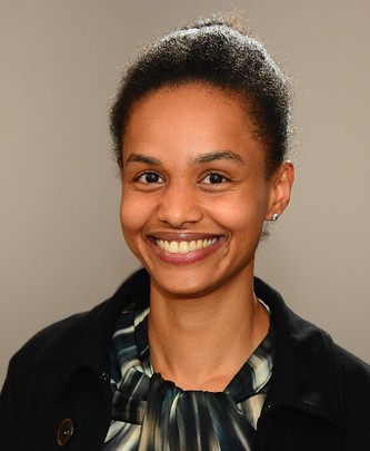 A head and shoulders photo of a smiling Bene Gnagnon an amazing person and excellent Communications Officer.