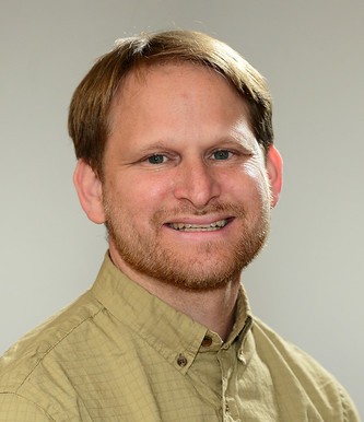 This is a photograph of a calm and smiling, Daniel Moglen, who is serving as President-Elect of the Graduate Career Consortium.