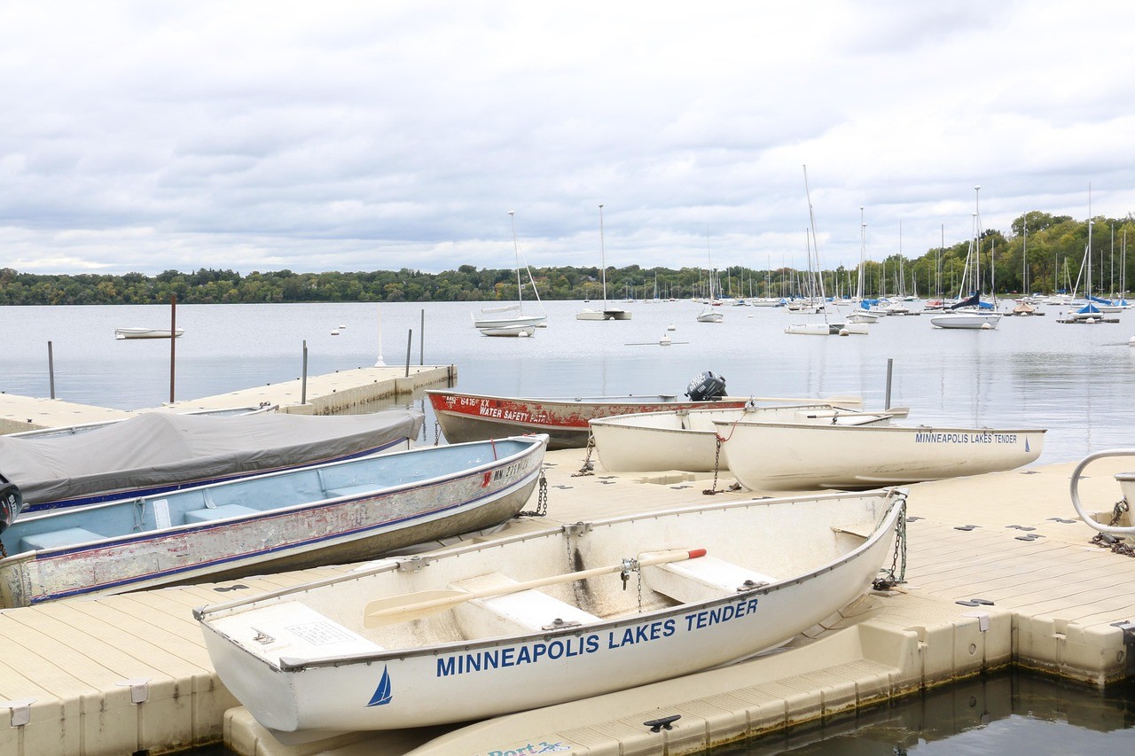 Minneapolis lake with boats. Row boats docked at a lake